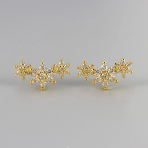 Golden flower star earrings with sparkling cubic zirconia crystals for women
