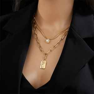 Vintage multi-layer titanium steel necklace with pearl and face relief pendant