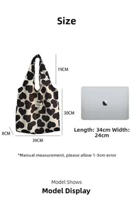 Detailed size guide for the heart-patterned corduroy tote bag showing exact measurements