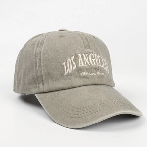 Detail of Los Angeles embroidery on washed vintage baseball cap with curved brim