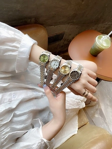 Classic women's waterproof watches with metal strap shown in diverse dial colors