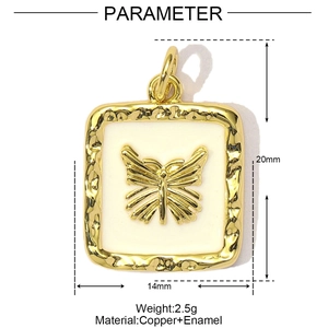 Detailed view of golden butterfly pendant with white enamel, size 20mm x 14mm