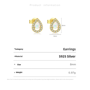 Detail shot of gold S925 silver teardrop studs with iridescent opal and zircons