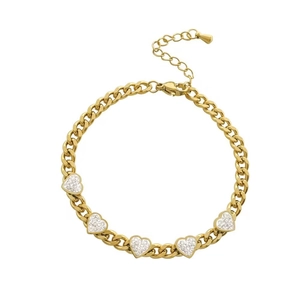 Macro shot of Cuban chain bracelet featuring five heart charms with sparkling pave stones