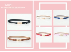 Close-up of square gold metal buckle and adjustable faux leather straps in various colors