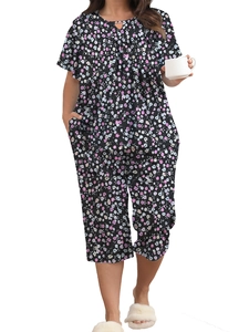 Detail of floral plus size loungewear set showing neckline hollow button and pockets