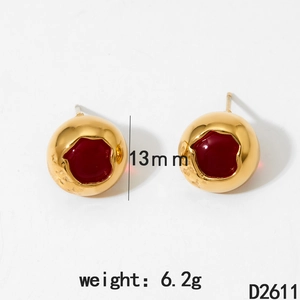 Detail shot of 13mm gold spherical stud earrings with red inlay, weight 6.2g