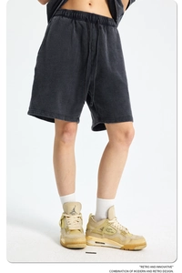 Detail view of heavy 420g charcoal grey washed cotton shorts with elastic drawstring waist