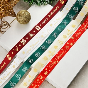 Detailed view of colorful 1cm Christmas ribbons with Merry Christmas gold printing