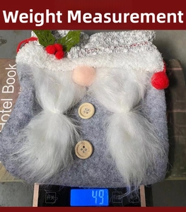Gnome themed Christmas gift bag weighing 49g on scale with knit texture and berry accents