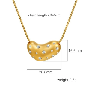 Gold titanium steel heart necklace with colored crystals and pearls on white background