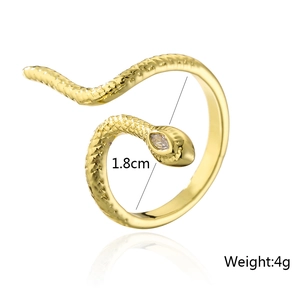 Detailed view of snake-shaped gold ring with zircon eyes showing 1.8cm diameter