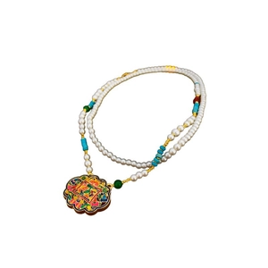 Ethnic beaded necklace with gold-plated lotus fan pendant and colorful floral bird motif