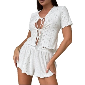 White lace two-piece pajama set with short sleeve tie-front top and matching shorts