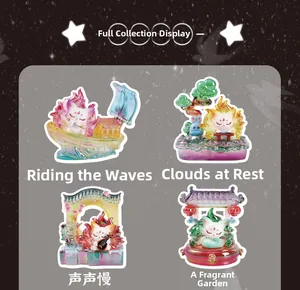 Detail view of four mythical nine-tailed fox figurines with traditional Chinese scenery