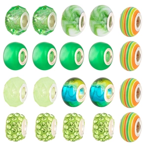 Macro shot of 20 assorted green ocean style glass and metal beads for DIY bracelets