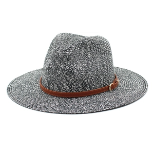 Fedora panama hat with black and white straw weave and brown leather belt detail