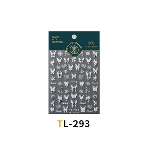 Macro detail of TL-293 butterfly and snowflake nail stickers with silver foil finish