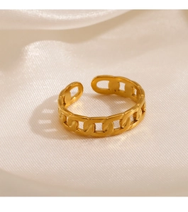 Macro detail of adjustable gold plated stainless steel cuban link chain ring
