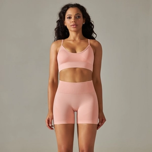 Detail of seamless knit texture on high waist yoga shorts and matching sports bra