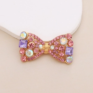 Sparkling zinc alloy bow accessory with pink rhinestones and purple gems for DIY crafts