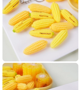 Macro detail of realistic miniature corn cob models with vivid yellow textures and grains