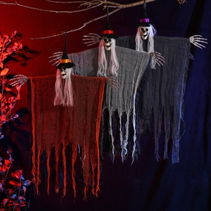 Three Halloween hanging skull ghosts with witch hats and colorful tattered robes