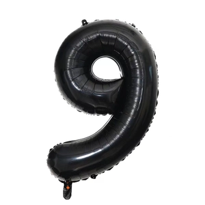 Detailed view of a 40-inch black number 9 foil balloon for birthday party decoration