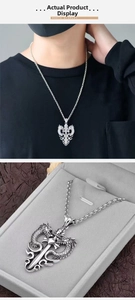 Close-up of vintage double dragon heart pendant and model wearing the necklace