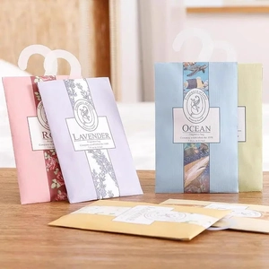 Fragrance sachet set with lavender and rose scents featuring hooks for closet hanging