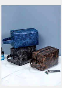 Detailed view of large waterproof PU leather travel toiletry bags in three vintage colors