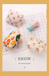 Floral makeup pouches and anti-exposure tape set displayed in a stylish lifestyle scene
