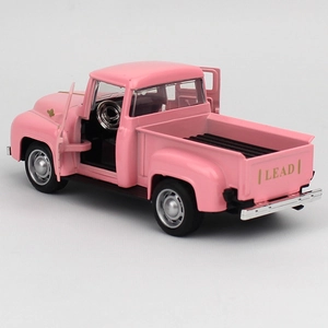 Detail view of pink vintage alloy pickup model with openable doors and LEAD text