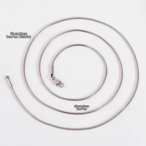 Detailed view of silver stainless steel snake chain necklace with secure lobster clasp
