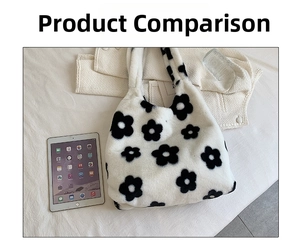 Detail of white plush tote bag with black floral pattern next to an iPad for size comparison
