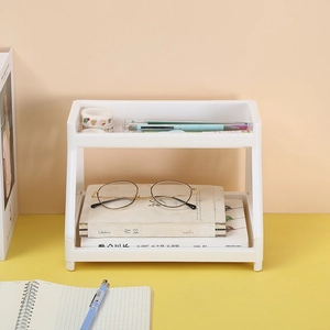 Two-tier white plastic desktop storage rack with cartoon cat paw design for cosmetics