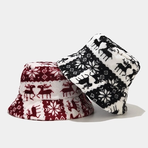 Winter plush bucket hat with festive Christmas reindeer and snowflake knit pattern