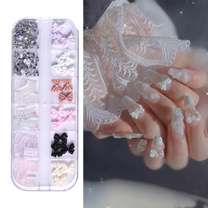 Aurora crystal butterfly nail charms set in a 12-grid storage box with colorful resin bows