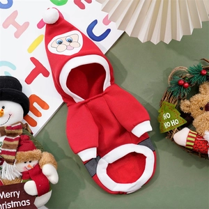 Close-up of red Christmas pet hoodie with Santa Claus patch and white pom-pom detail
