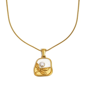 Vintage 18K gold plated necklace with pearl flower pendant and white enamel detail