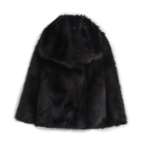 Detail of plush black faux fur texture and wide lapel collar on winter coat