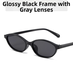 Detail of oval nerd sunglasses with bright black resin frame and grey lenses
