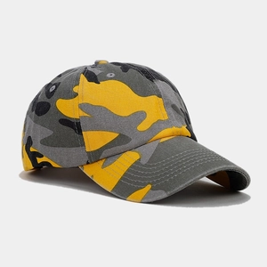 Detail of classic camouflage baseball cap with breathable eyelets and curved brim