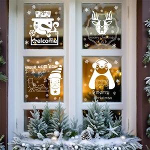 White Christmas window stickers featuring snowman, reindeer, and snowflakes for decor