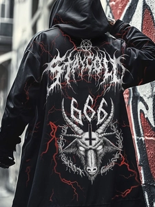 Macro detail of gothic hoodie back print featuring Stay Cold graphics in dark urban alleyway