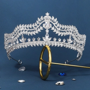 Close-up of bridal crown with silver leaf patterns and sparkling crystal rhinestones