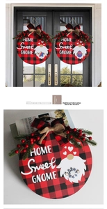 Detail showing wooden Home Sweet Gnome sign with buffalo plaid pattern and pine needles