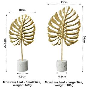 Detailed dimensions of golden monstera leaf metal decor with marble base for desktop