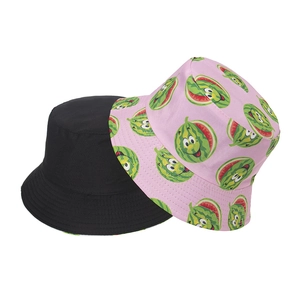 Cute reversible sun hat with funny cartoon watermelon pattern in black and pink cotton canvas
