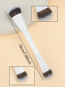 Dual-ended makeup brush with white handle and gradient bristles measuring 18cm for contouring
